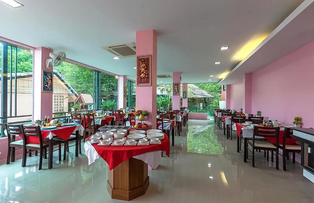 On-site restaurant and breakfast area with tables set for the buffet